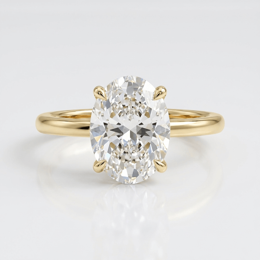 GOLD OVAL DIAMOND SOLITAIRE RING
