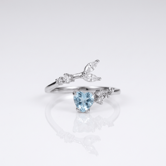 SILVER BLUE TOPAZ SOLITAIRE RING - (ADJUSTABLE)
