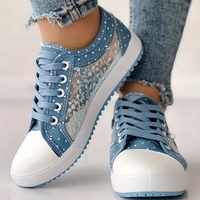 Delara – Elegant Floral Detail Trainers