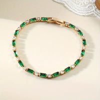 Gold Emerald Alternating Tennis Bracelet