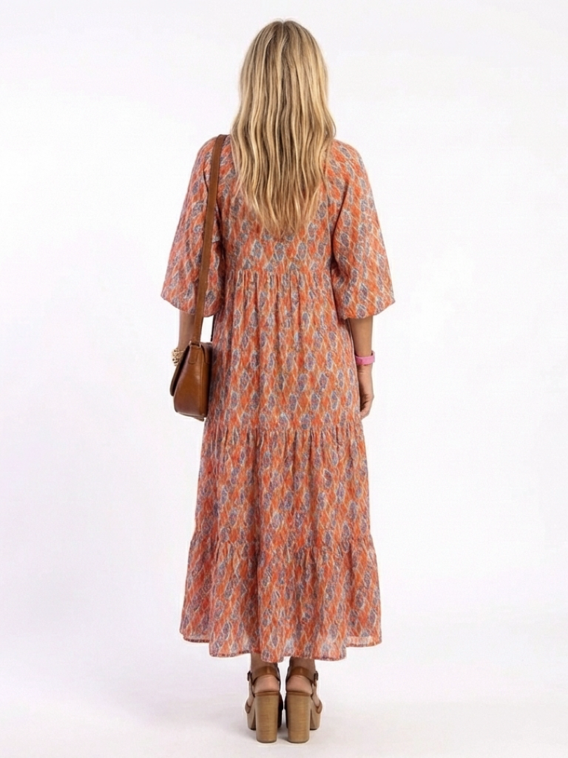 Tabitha – Geometric Print V-Neck Tiered Midi Dress
