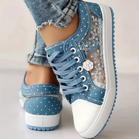 Delara – Elegant Floral Detail Trainers