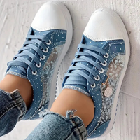 Delara – Elegant Floral Detail Trainers