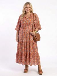 Tabitha – Geometric Print V-Neck Tiered Midi Dress
