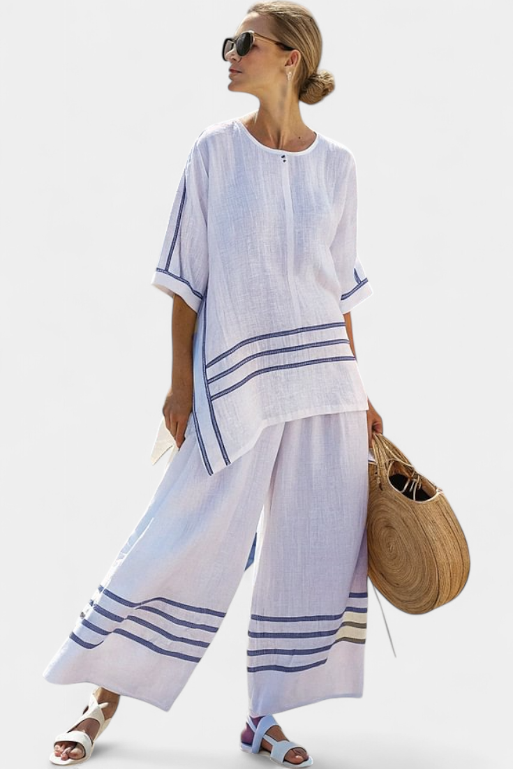 Lilibet – Sophisticated Striped Asymmetric Top and Bold Trousers