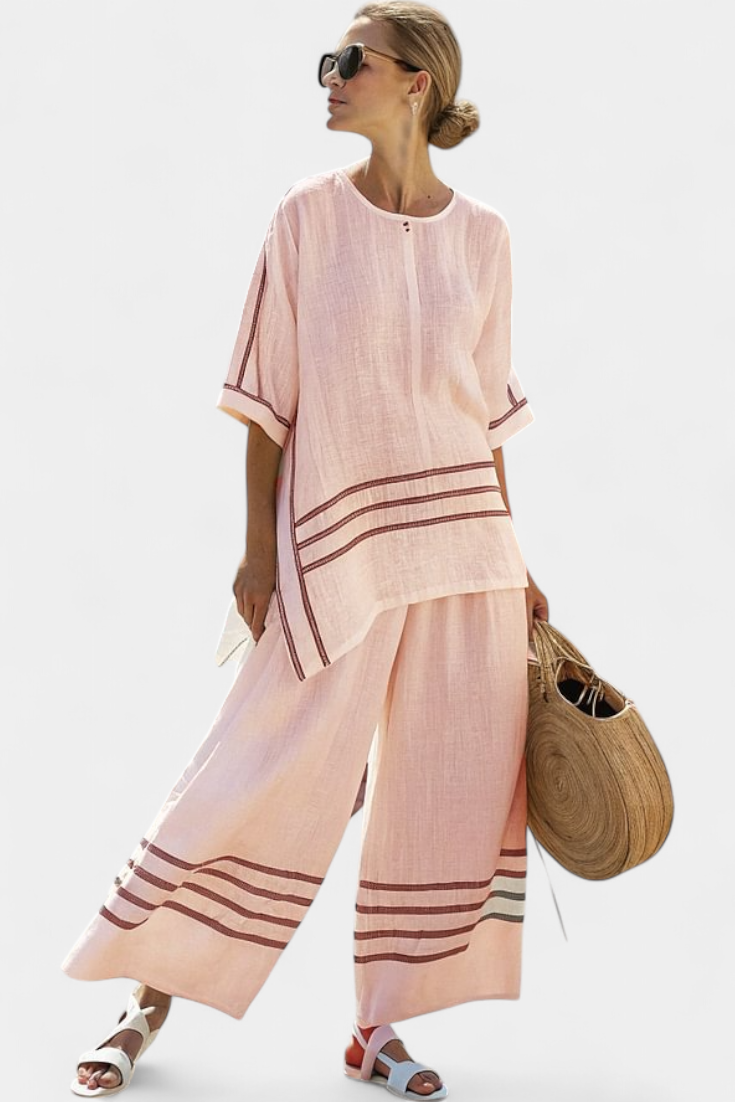 Lilibet – Sophisticated Striped Asymmetric Top and Bold Trousers
