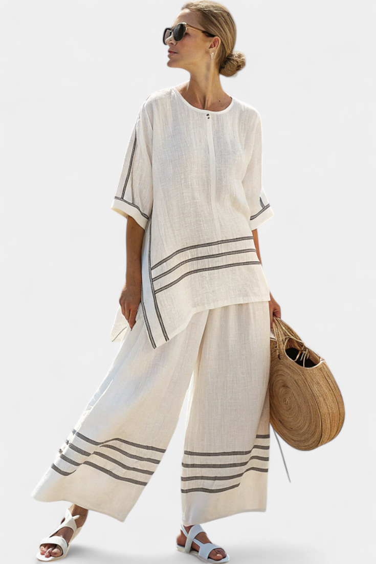 Lilibet – Sophisticated Striped Asymmetric Top and Bold Trousers