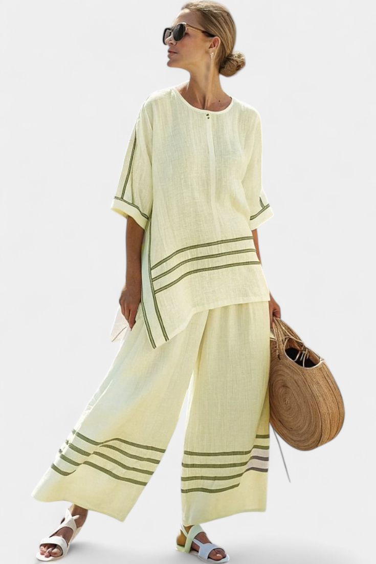 Lilibet – Sophisticated Striped Asymmetric Top and Bold Trousers