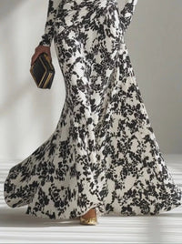 Elara – Black and White Wrap Dress