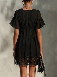 Anneliese – Black Mini Dress with Gold Zip