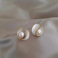 Delara – Classic Gold Pearl Stud Earrings