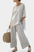 Lavinia – Elegant Asymmetric Blouse and Striped Trousers