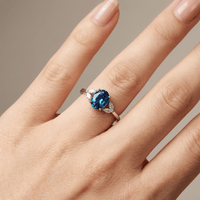 SILVER BLUE TOPAZ OVAL RING - (ADJUSTABLE)